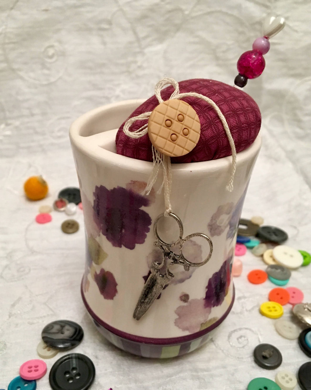 Pincushion, purple/blue pansies on upcycled holder for pins and tools